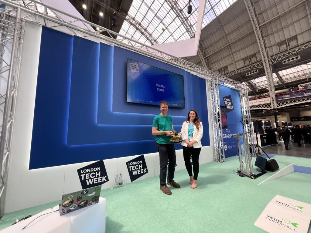 Robert and Niki on stage at London Tech Week.