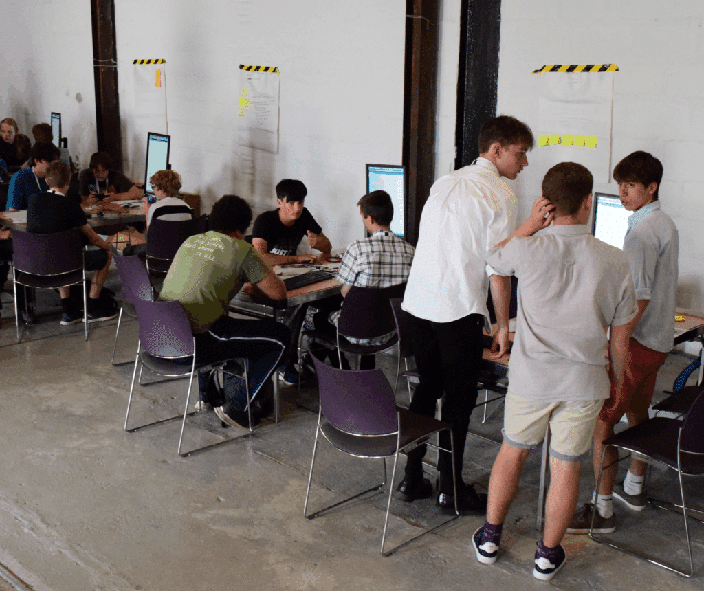 Mission to Mars students working at their desks on the code